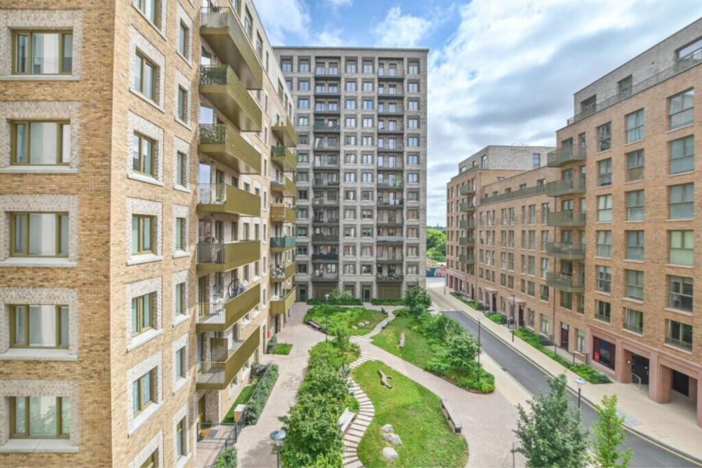 External view of build to rent development around a central park courtyard