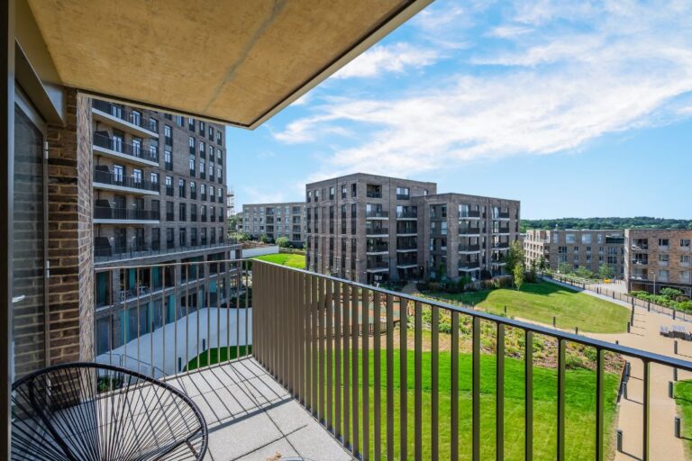 Private balcony at Wolff House overlooking landscaped gardens and Ridgeway Views