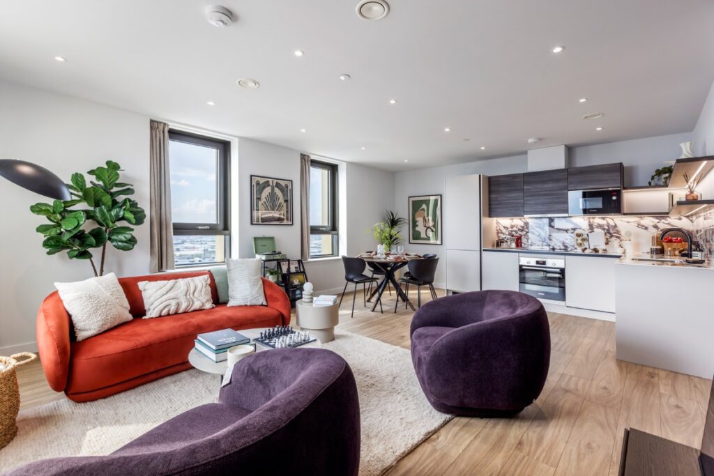 Fully furnished open plan living space in UNCLE Acton apartment