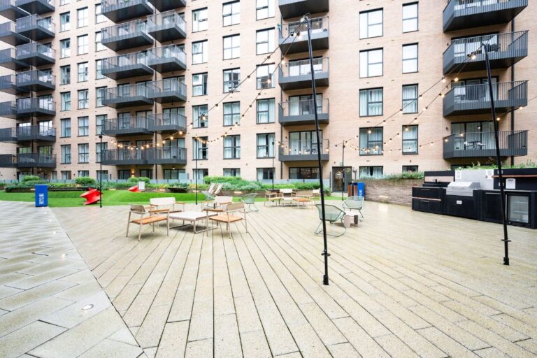 Exterior of UNCLE Colindale apartments in NW9 with private balconies and landscaped courtyard