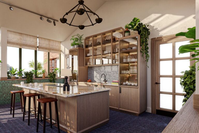 Stylish communal kitchen with island seating, feature lighting, and large windows