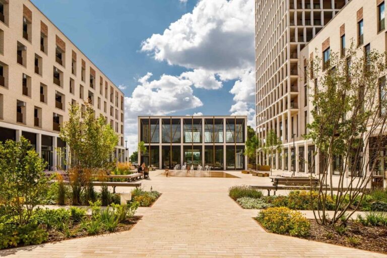Pedestrian plaza with landscaped planting and community building