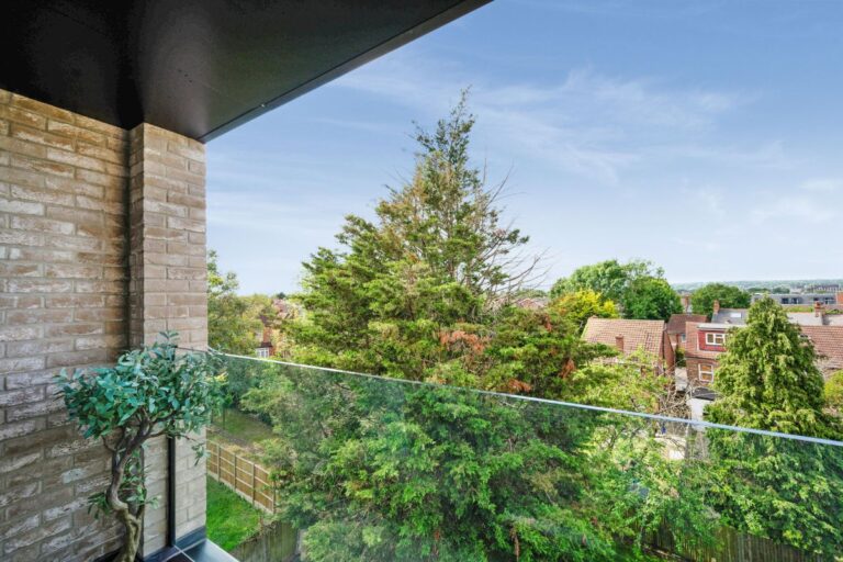 Private balcony overlooking residential Harrow neighbourhood
