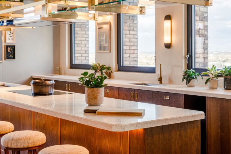 Private dining kitchen at The Gessner with island counter seating and contemporary interior design