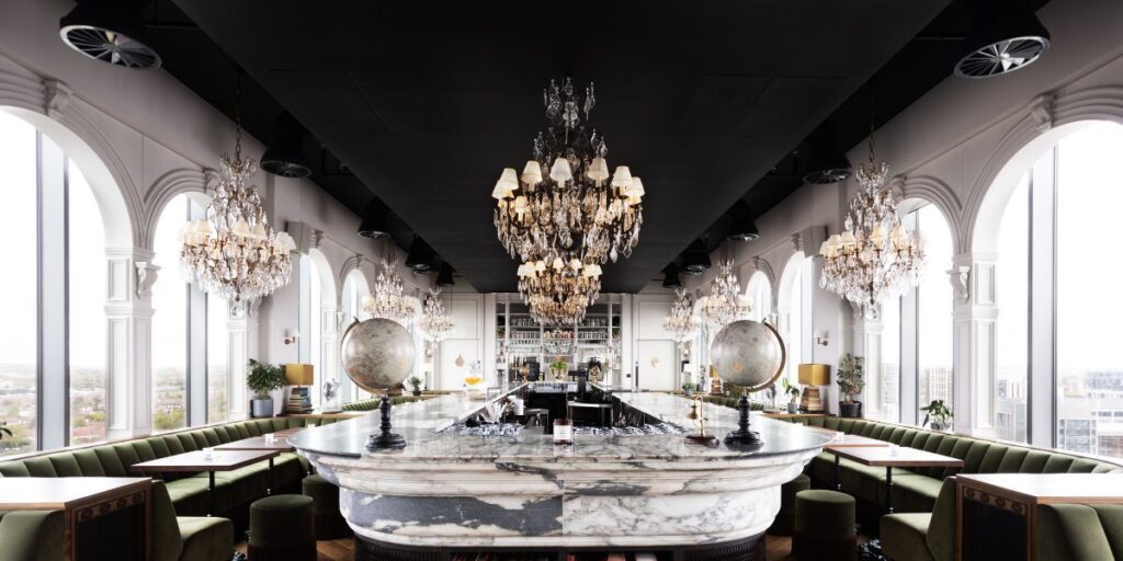 Dandi Wembley residents lounge with marble bar and statement chandeliers