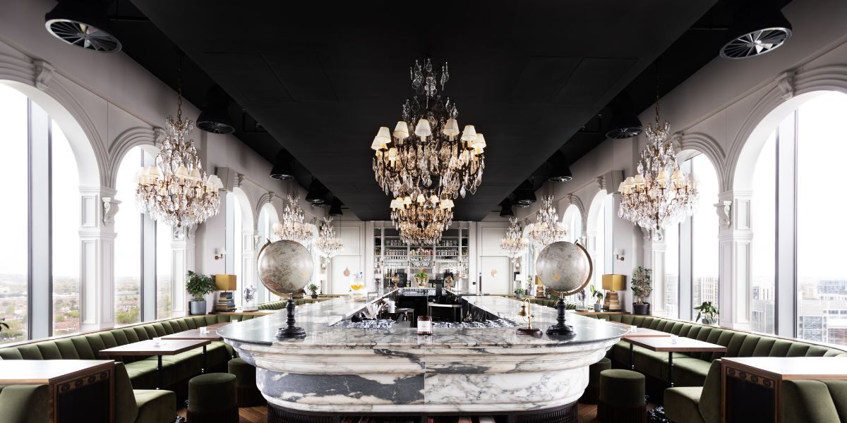Dandi Wembley residents lounge with marble bar and statement chandeliers