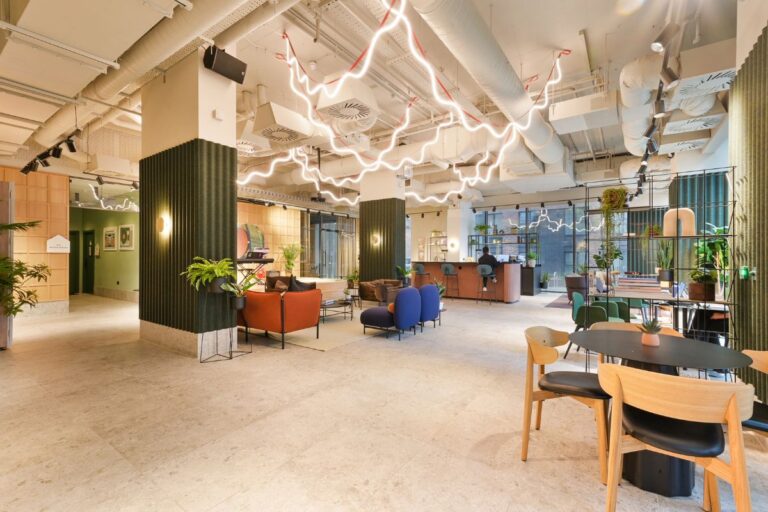Communal lounge and workspace inside UNCLE Colindale apartments in North West London