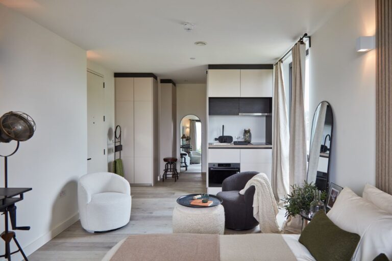 Studio apartment layout with built in storage and open plan design