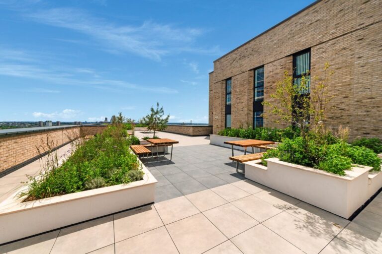 North Kensington roof terrace on sunny day with planter boxes