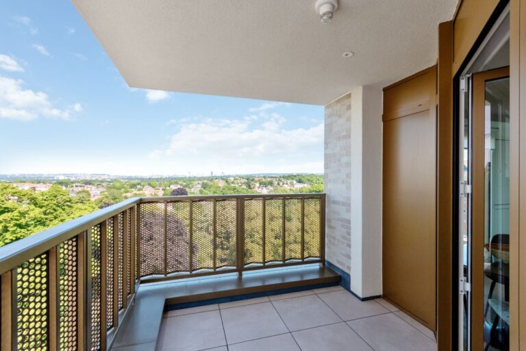 Modern apartment at Sutton Park House with open balcony and views across Sutton town centre