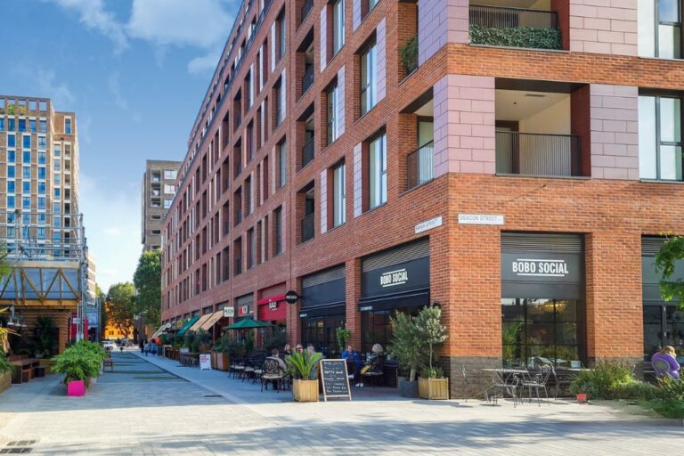 Outdoor café seating and independent shops within the Elephant Park development in Elephant & Castle