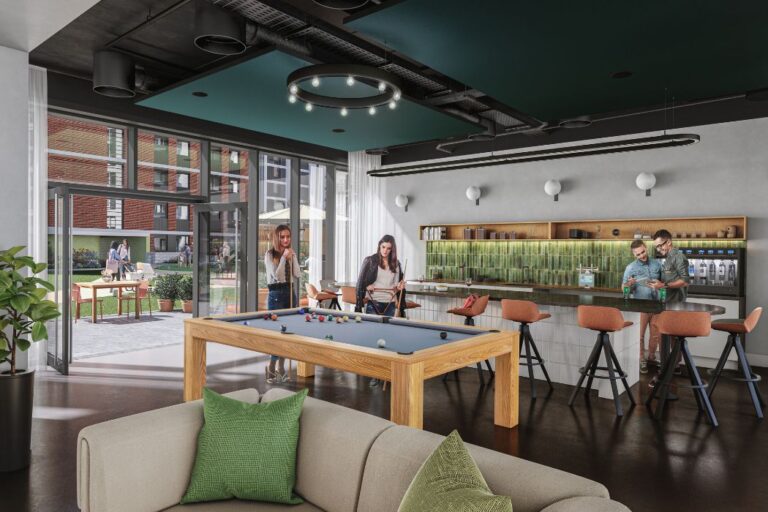 Residents playing pool in Repton Gardens communal lounge Wembley Park