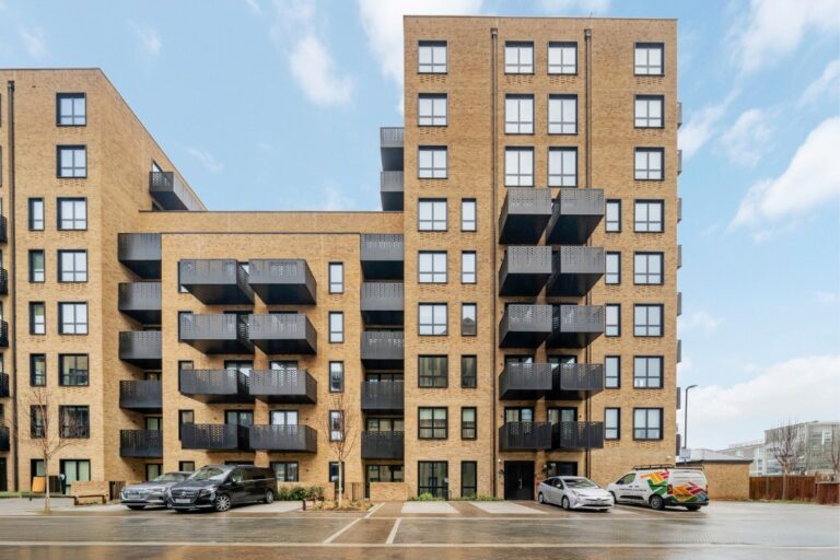 Exterior of Hanwell Square building with balconies and parking