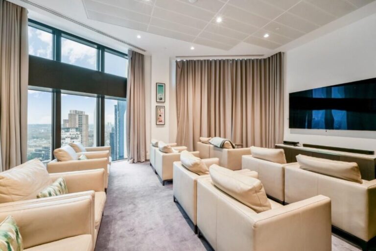 Private cinema room at Amory Tower with lounge seating