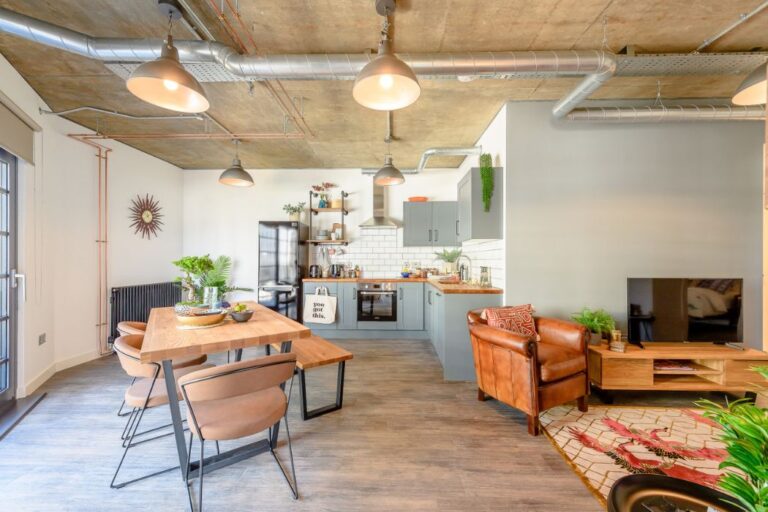 modern kitchen with wood worktops in Ferrum Wembley apartment