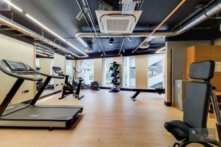 Residents gym with treadmills, weights and exercise machines