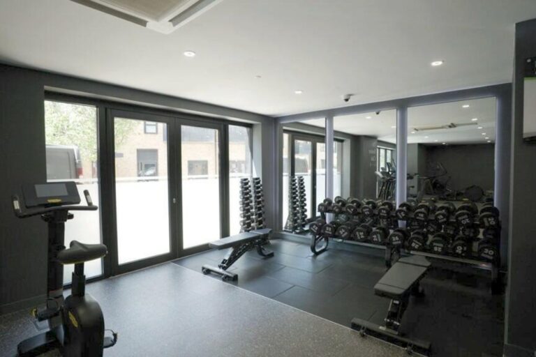 Residents gym at Hanwell Square with weights and cardio equipment