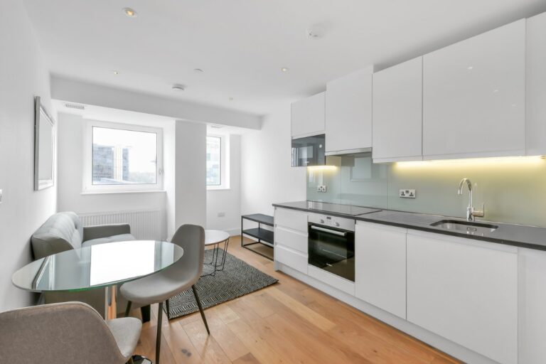 Open plan apartment interior at The Residences Croydon with fitted kitchen and dining area
