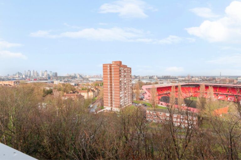 Views of Charlton Football Club and Canary Wharf from The Heights