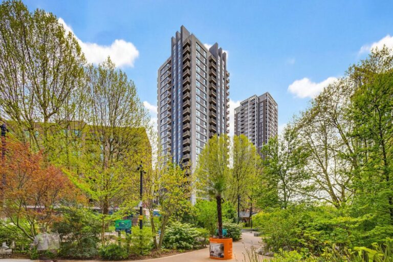 Modern residential towers surrounded by landscaped gardens and greenery in Elephant and Castle