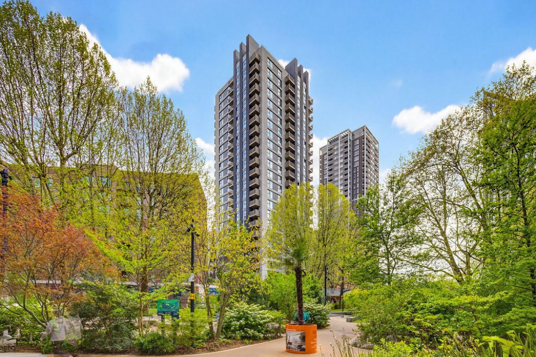 Modern residential towers surrounded by landscaped gardens and greenery in Elephant and Castle