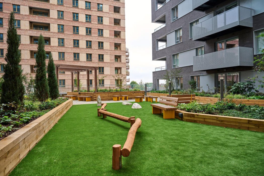 Landscaped podium garden at Fortunes Dock in Canning Town with seating areas and communal outdoor space