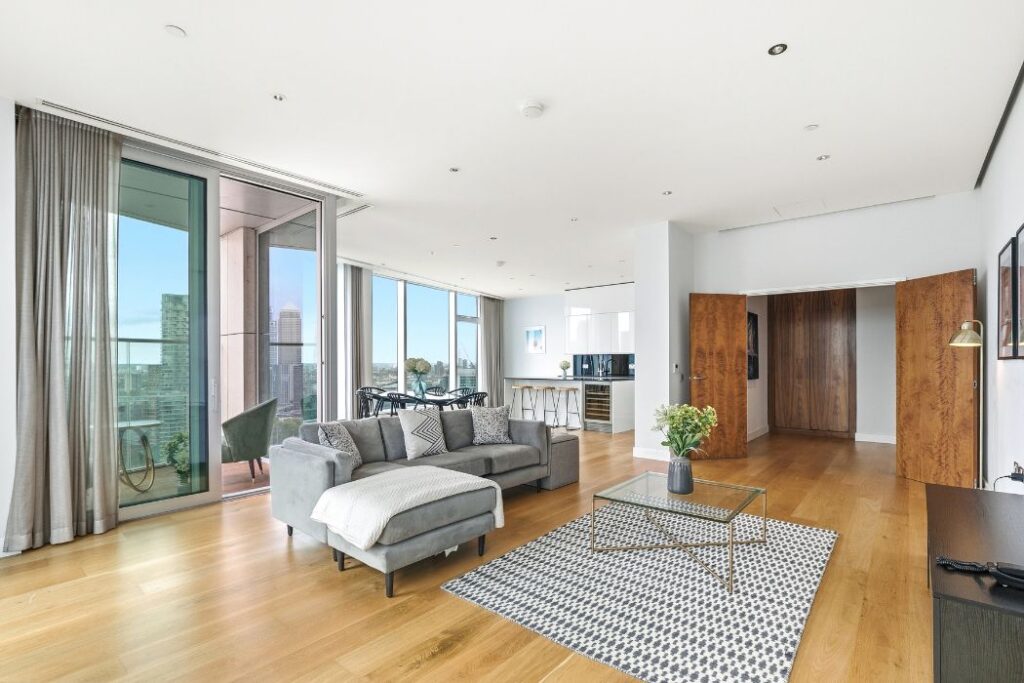 Open plan living and dining area inside an apartment at Arora Tower