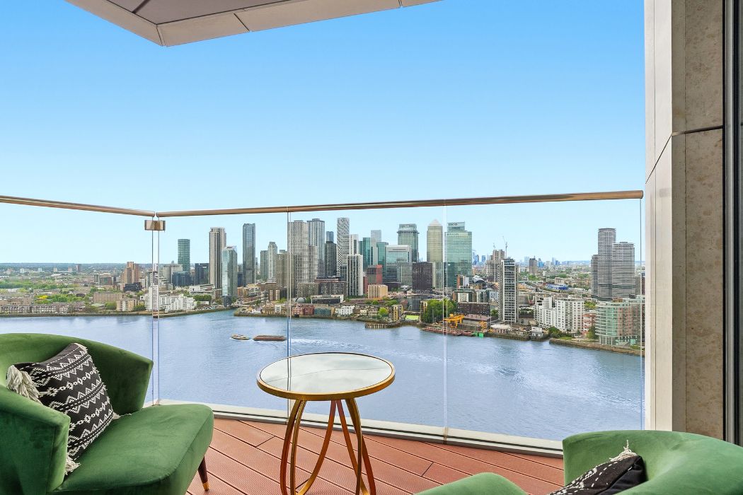 Private balcony at Arora Tower overlooking the River Thames and Canary Wharf skyline