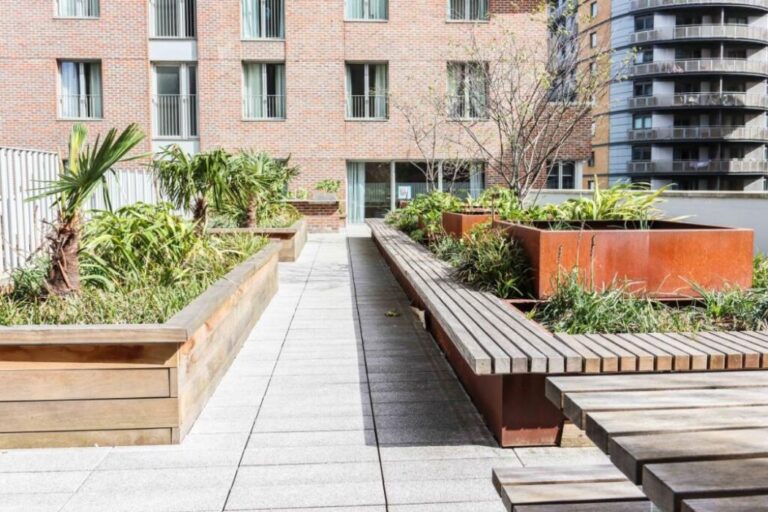 Landscaped rooftop terrace and seating area at Rehearsal Rooms in North Acton