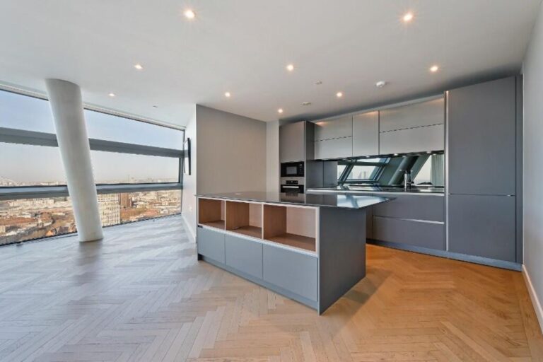 Designer kitchen with island unit inside a luxury penthouse apartment at Two Fifty One