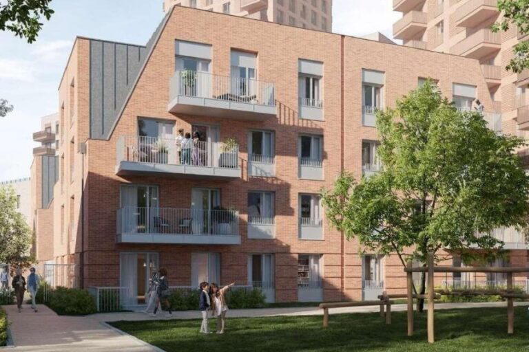 Exterior view of Royal Gateway apartments in Acton with landscaped surroundings