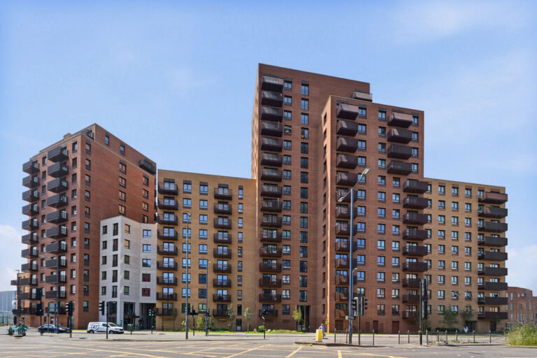 Exterior view of Royal Gateway apartments in Acton with landscaped surroundings and private balconies