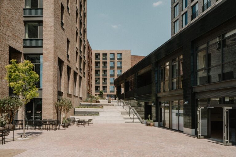 Landscaped courtyard between residential buildings at Mason & Fifth