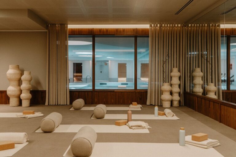 Yoga and wellness studio overlooking the indoor pool
