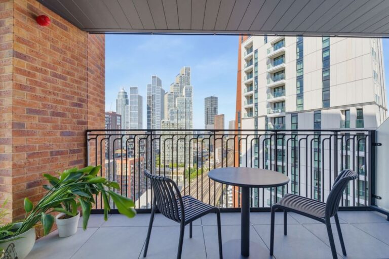 Private apartment balcony at Apex One with seating and views across Nine Elms